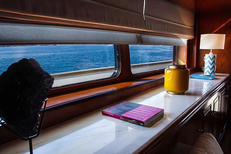 a bear sitting in a chair aboard MASQUENADA Yacht for Sale