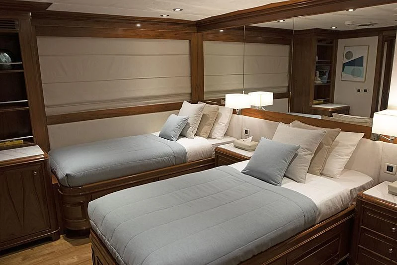 a bed in a room aboard MASQUENADA Yacht for Sale