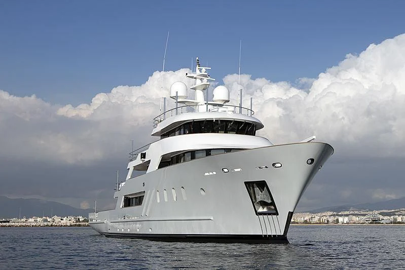 a large white ship on the water aboard MASQUENADA Yacht for Sale