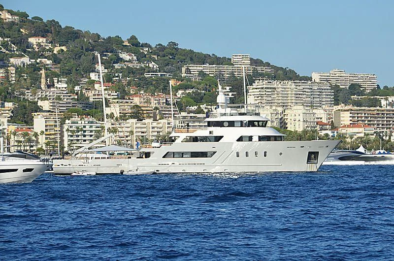 a large white boat in the water aboard MASQUENADA Yacht for Sale