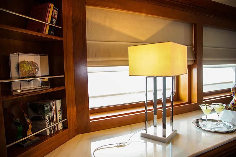 a lamp on a table aboard MASQUENADA Yacht for Sale