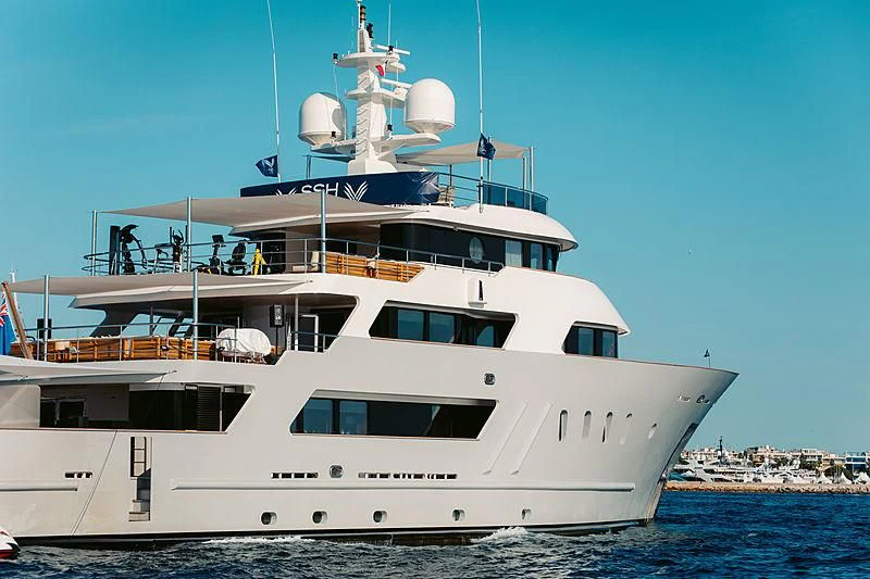 a large white boat in the water aboard MASQUENADA Yacht for Sale