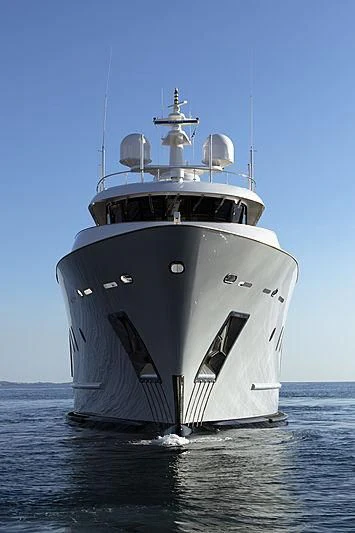 a large ship in the water aboard MASQUENADA Yacht for Sale