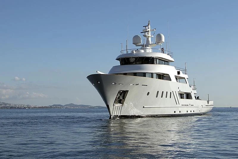 a large white boat in the water aboard MASQUENADA Yacht for Sale
