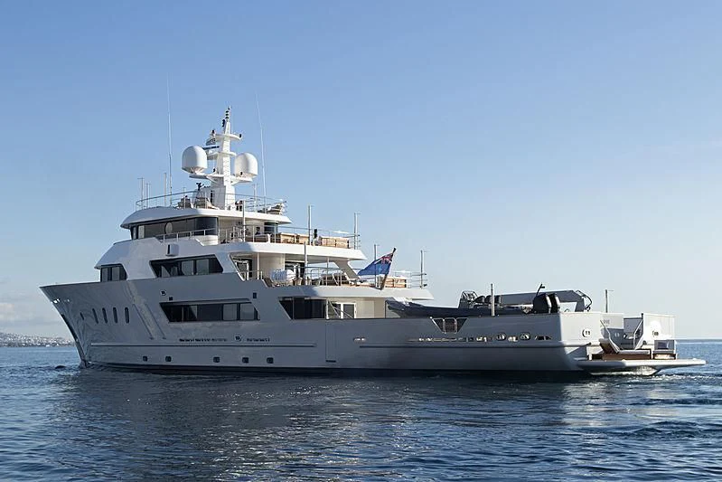 a large white boat in the water aboard MASQUENADA Yacht for Sale