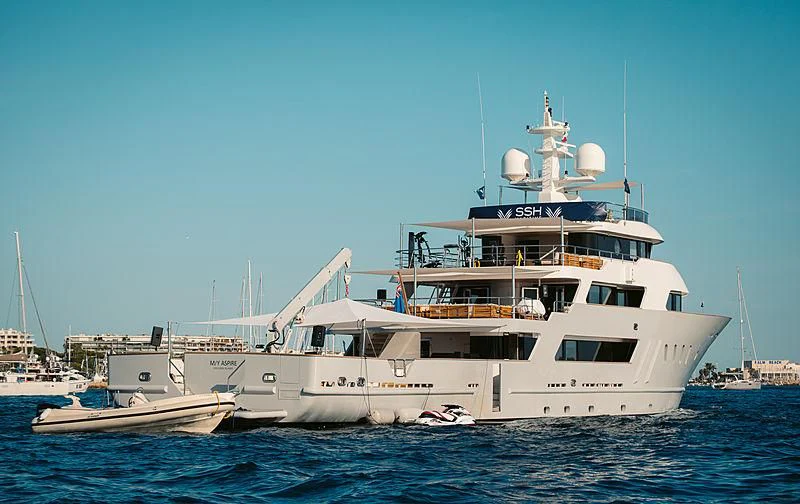 a large white boat in the water aboard MASQUENADA Yacht for Sale