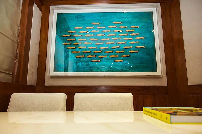 a large screen on a wall aboard MASQUENADA Yacht for Sale
