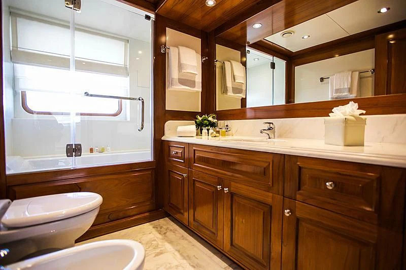a bathroom with a sink and a toilet aboard MASQUENADA Yacht for Sale