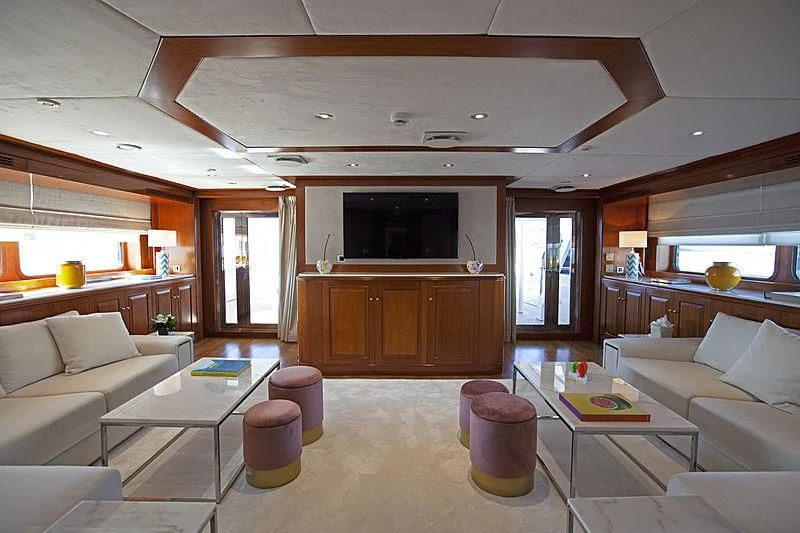 a living room with a large window aboard MASQUENADA Yacht for Sale