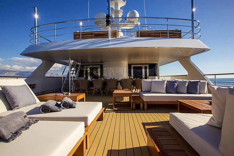 a large living room with a large balcony aboard MASQUENADA Yacht for Sale