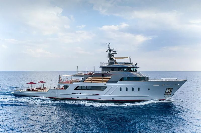 a large white boat in the water aboard MASQUENADA Yacht for Sale