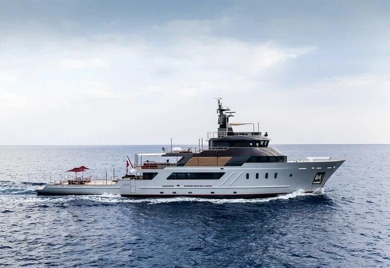 a large white boat in the water aboard MASQUENADA Yacht for Sale
