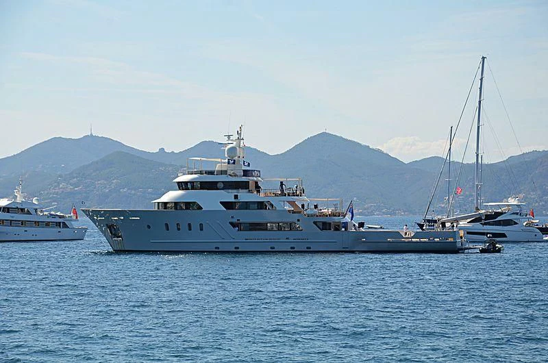 a large white boat in the water aboard MASQUENADA Yacht for Sale