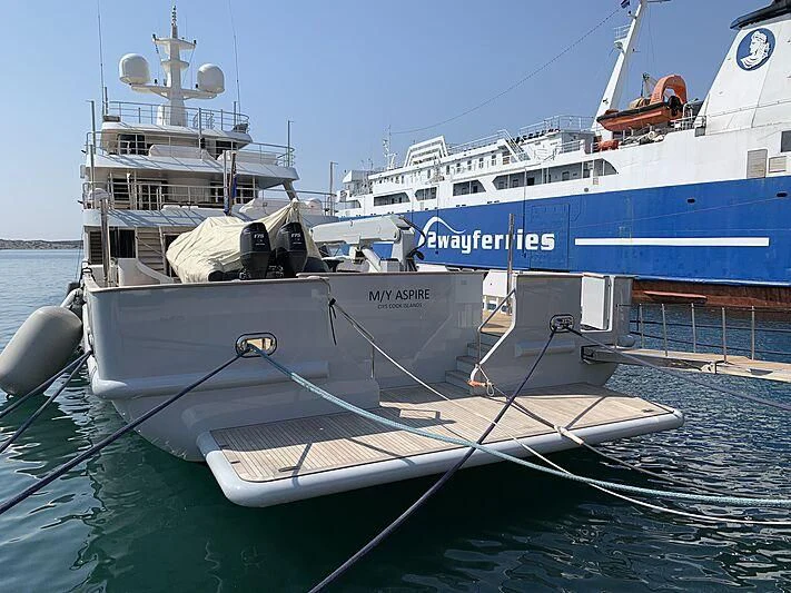 a couple of boats sit in the water aboard MASQUENADA Yacht for Sale