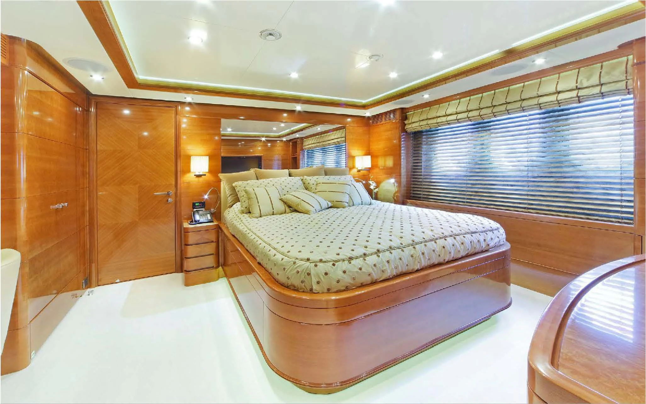 a large bedroom with a large bed aboard EVERBLUE Yacht for Sale