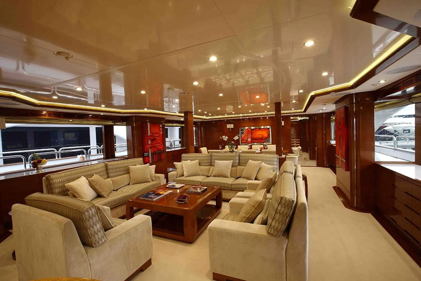 a living room with a large window aboard EVERBLUE Yacht for Sale