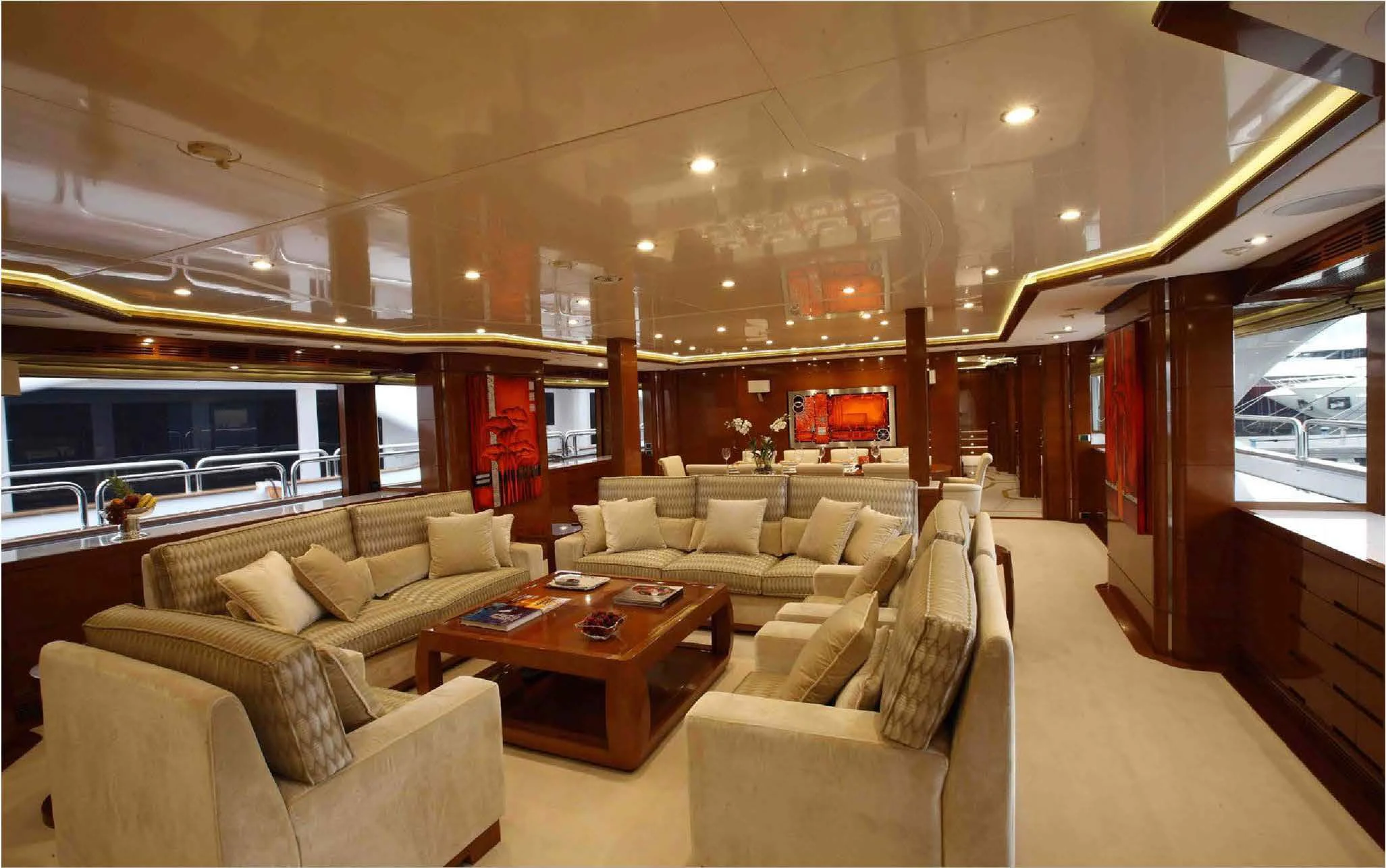 a living room with a large window aboard EVERBLUE Yacht for Sale