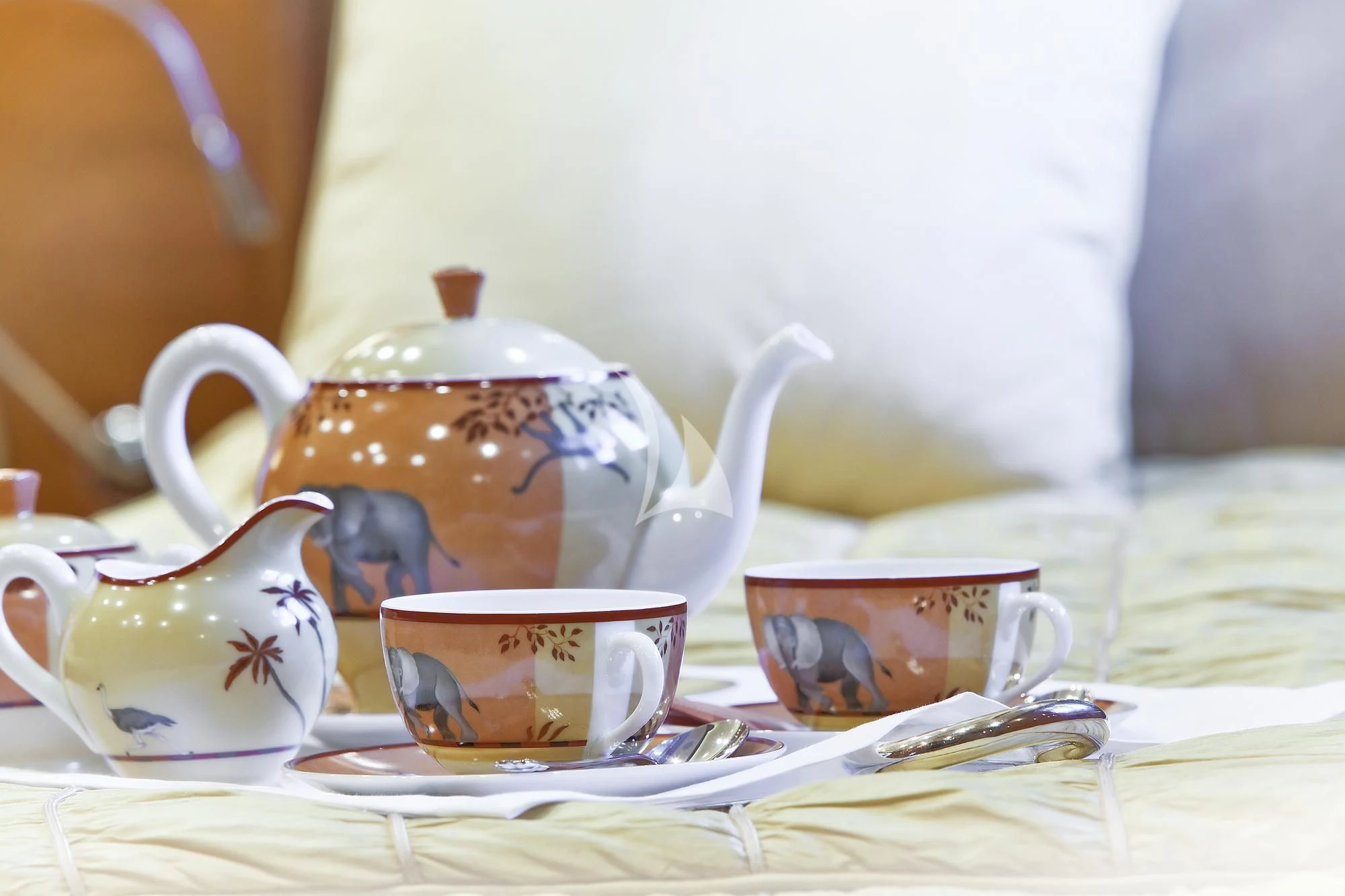 a tea set with tea cups and saucers aboard EVERBLUE Yacht for Sale