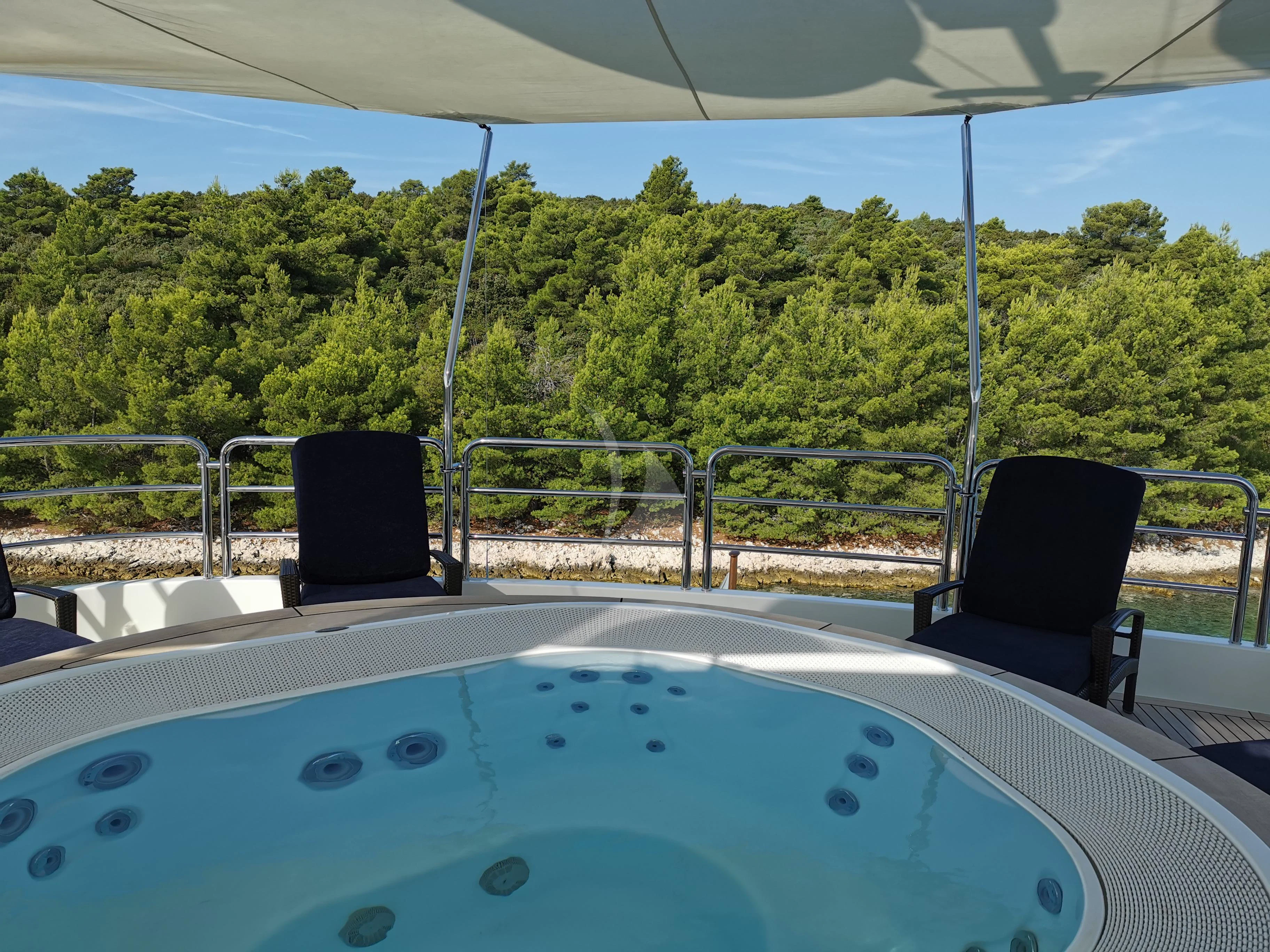 a chair on a boat aboard EVERBLUE Yacht for Sale