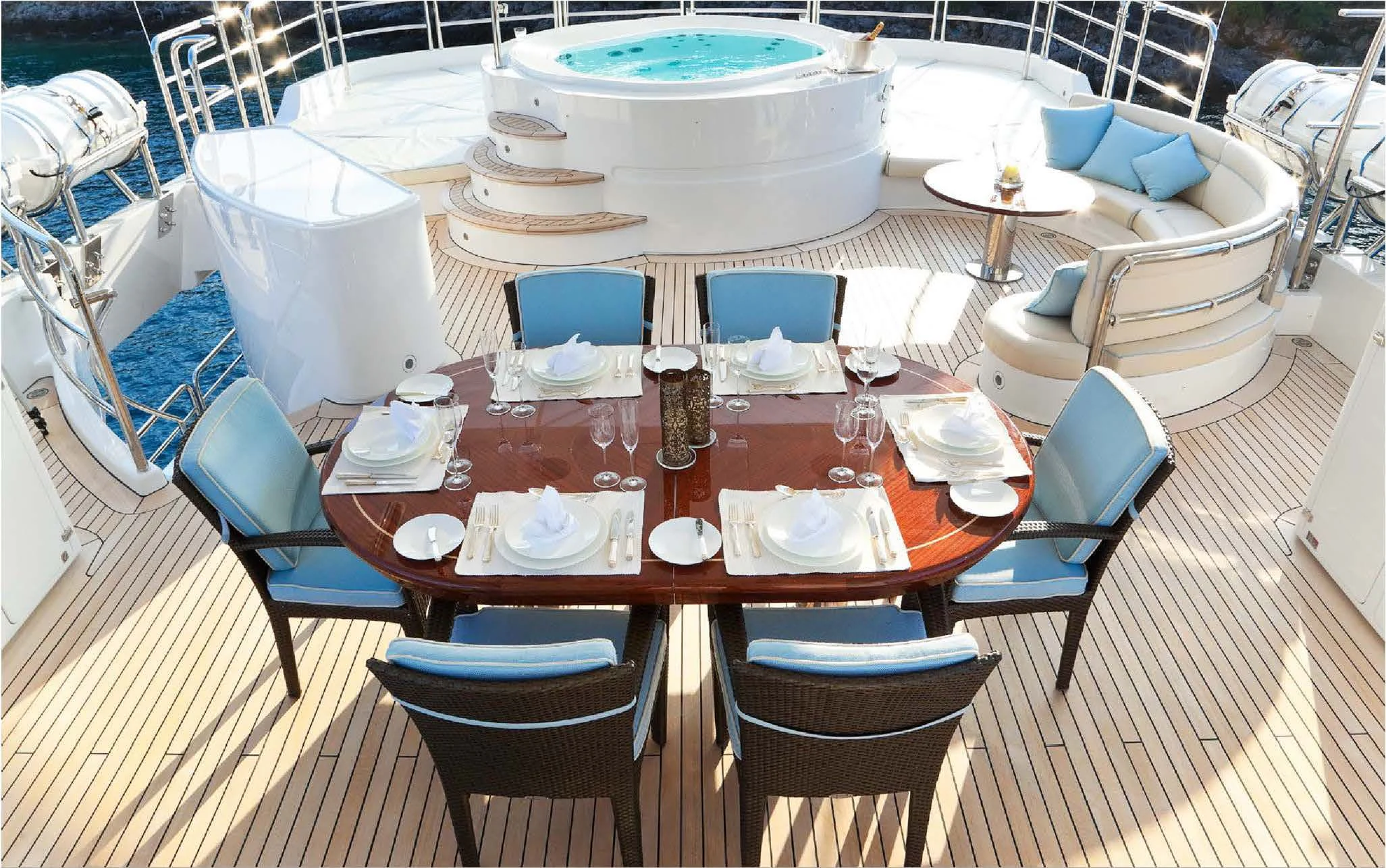 a table set for a dinner aboard EVERBLUE Yacht for Sale