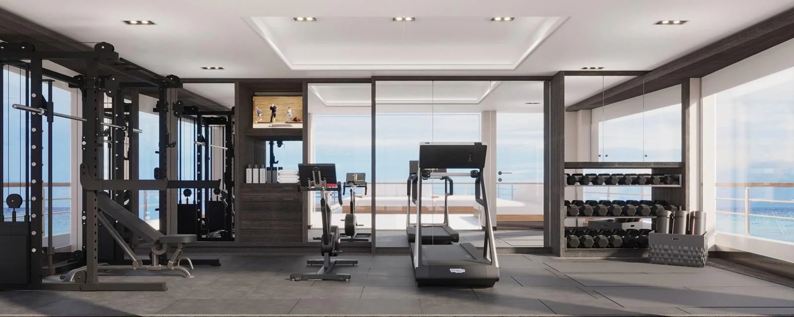 a gym with treadmills aboard LES CINQ Yacht for Sale
