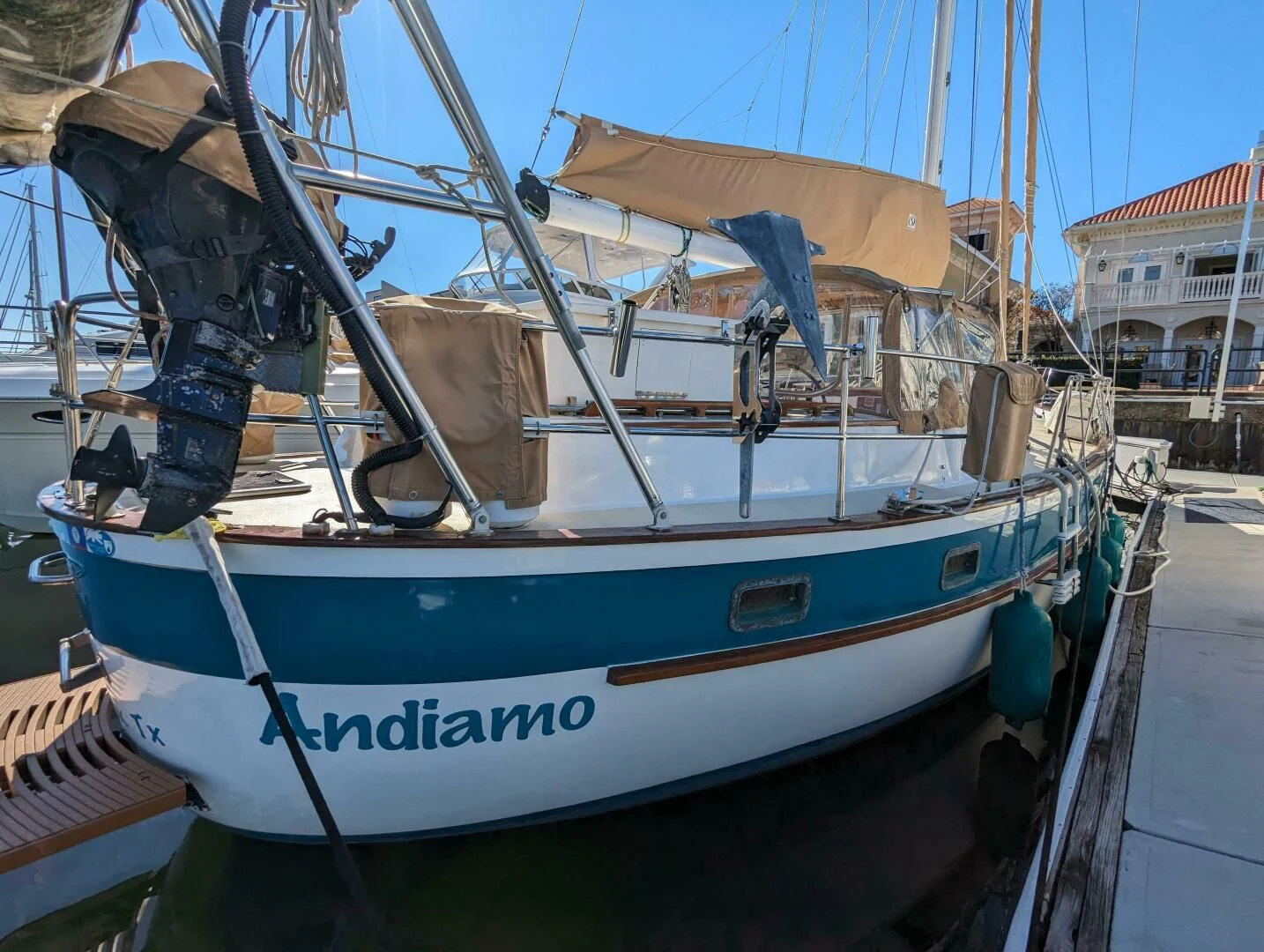 a boat docked at a pier aboard ANDIAMO Yacht for Sale