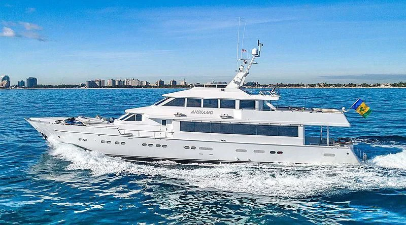a white yacht in the water aboard ANDIAMO Yacht for Sale