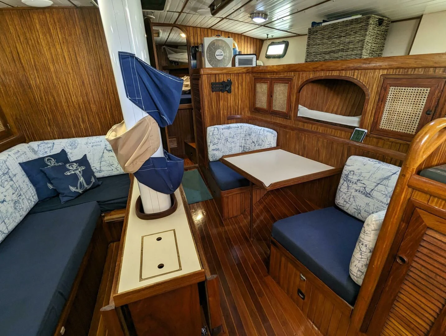 a room with a bed and a chair aboard ANDIAMO Yacht for Sale