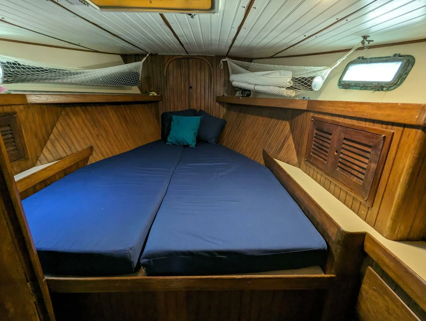 a bed in a room aboard ANDIAMO Yacht for Sale