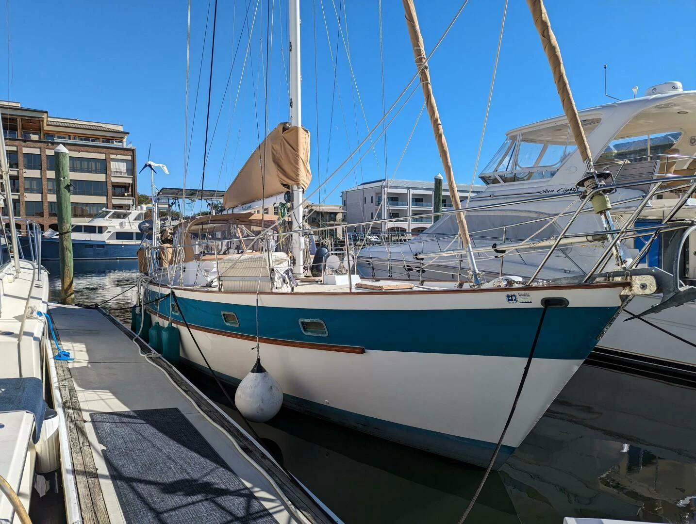 a boat docked at a pier aboard ANDIAMO Yacht for Sale