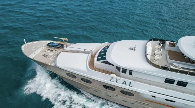 a white boat on the water aboard SEA CLASS Yacht for Sale