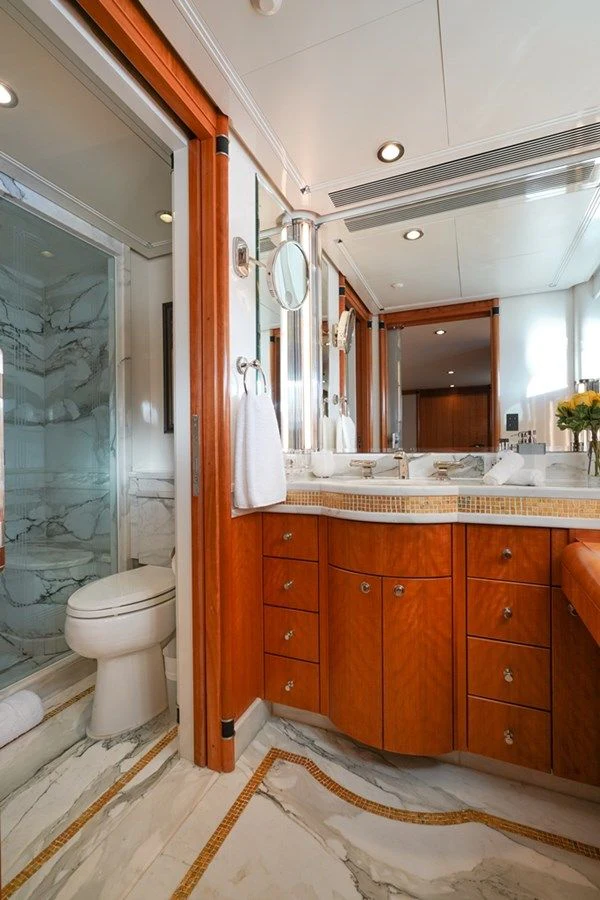 a bathroom with a glass shower aboard SEA CLASS Yacht for Sale
