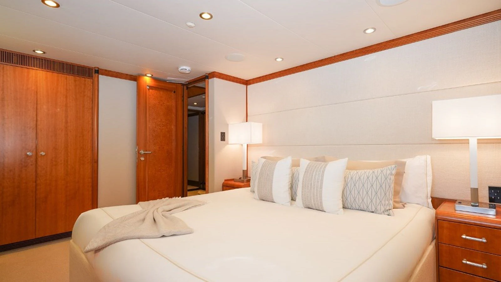 a hotel room with a bed and a desk aboard SEA CLASS Yacht for Sale