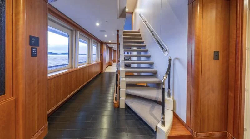 a long hallway with a set of stairs aboard SEA CLASS Yacht for Sale
