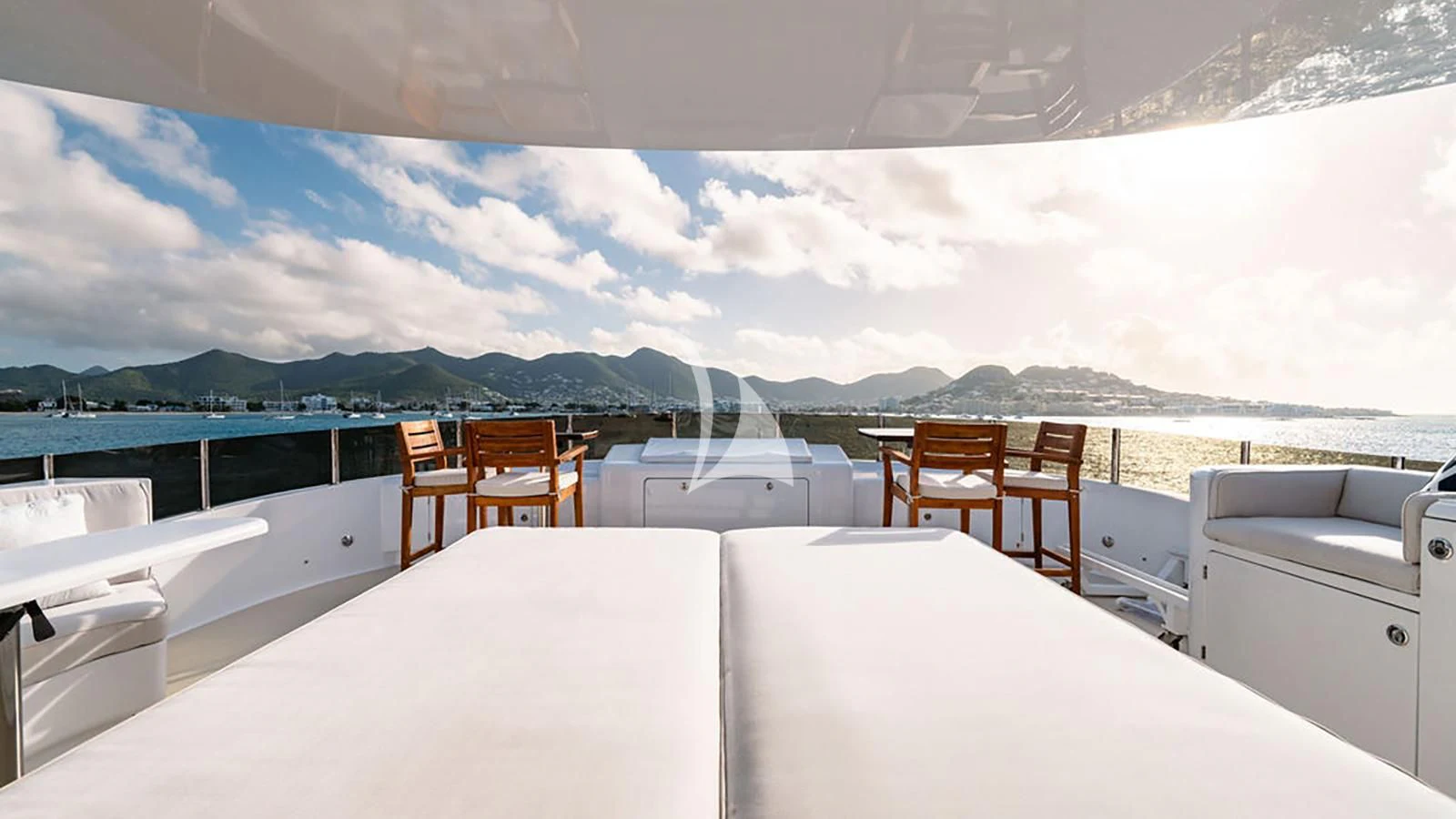 a room with a view of the ocean and mountains aboard SEA CLASS Yacht for Sale