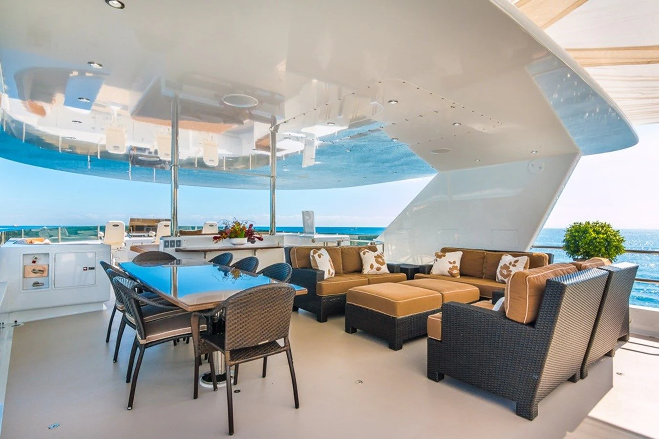 a room with a table and chairs aboard SEA CLASS Yacht for Sale