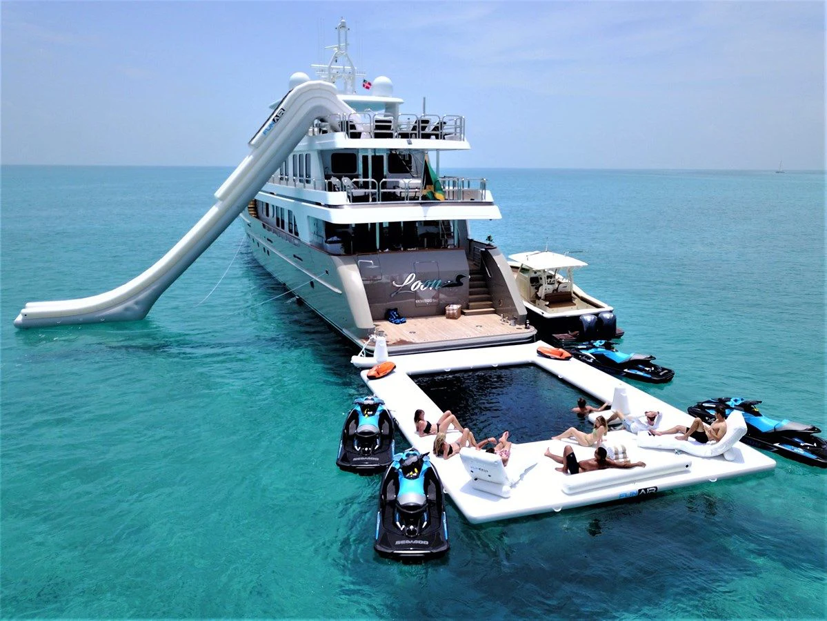 a boat carrying people on it aboard SEA CLASS Yacht for Sale