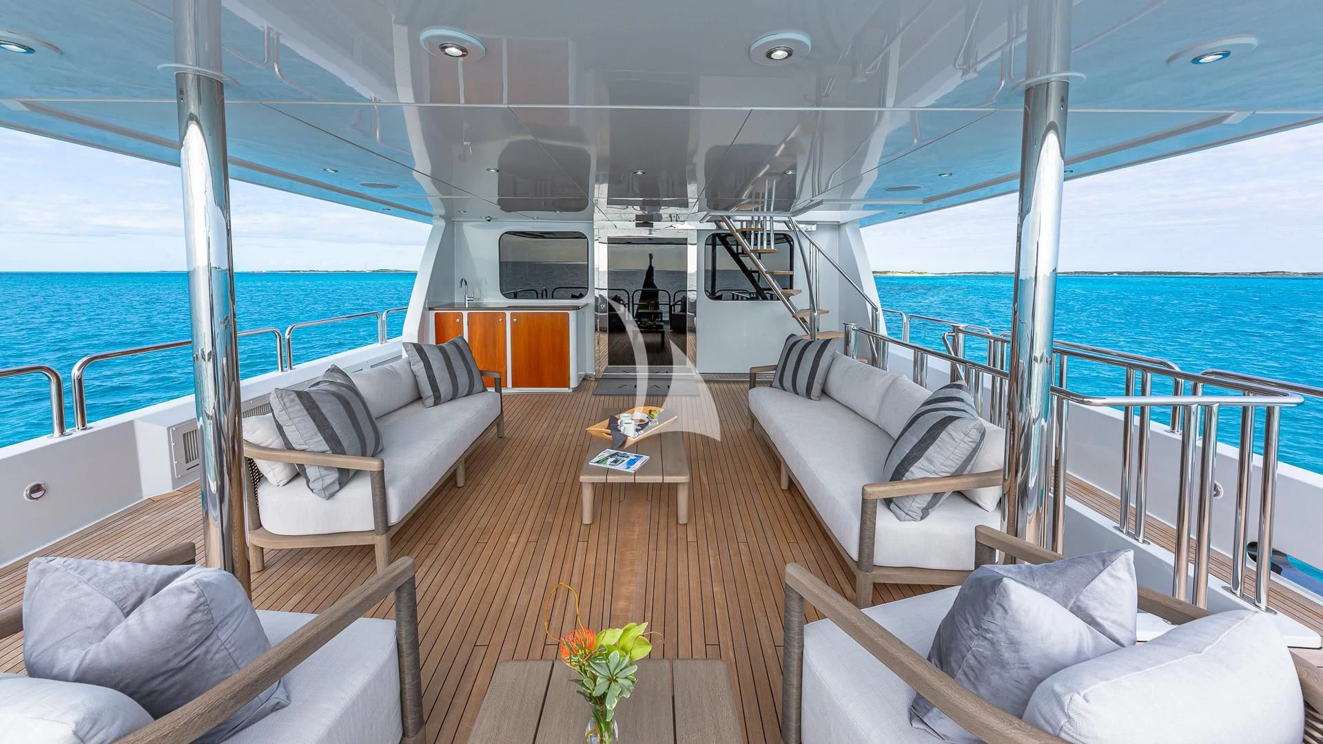 a boat with a deck and chairs aboard SEA CLASS Yacht for Sale