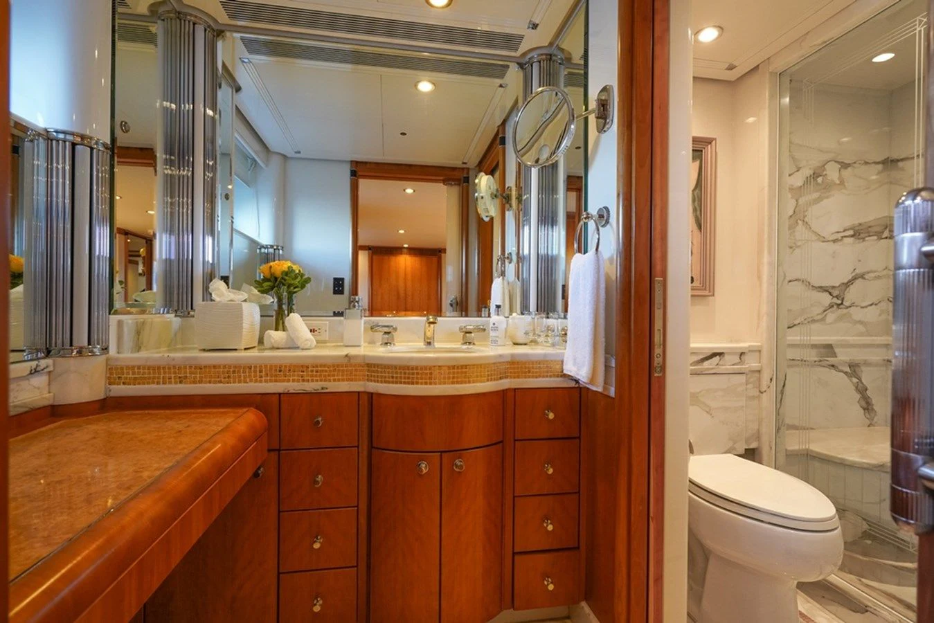 a bathroom with a large mirror aboard SEA CLASS Yacht for Sale