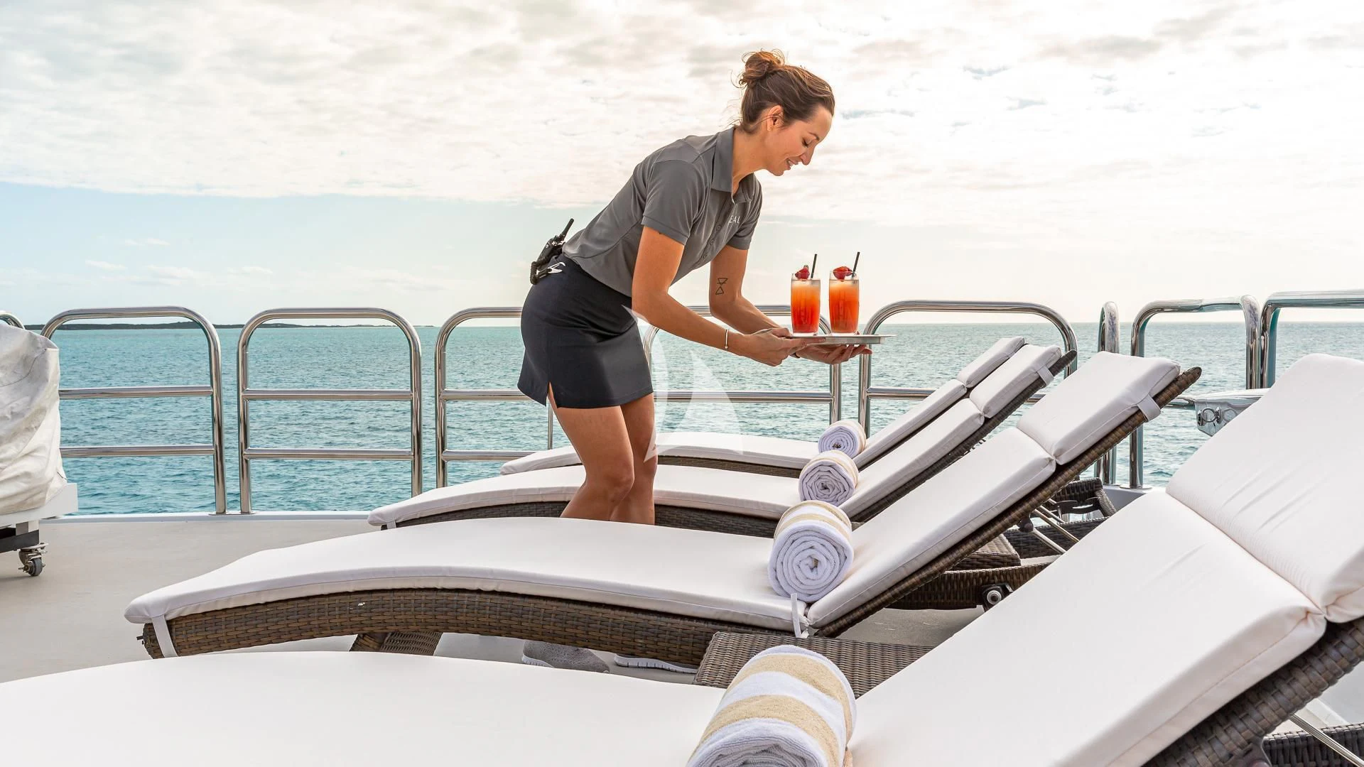 a person standing on a boat aboard SEA CLASS Yacht for Sale