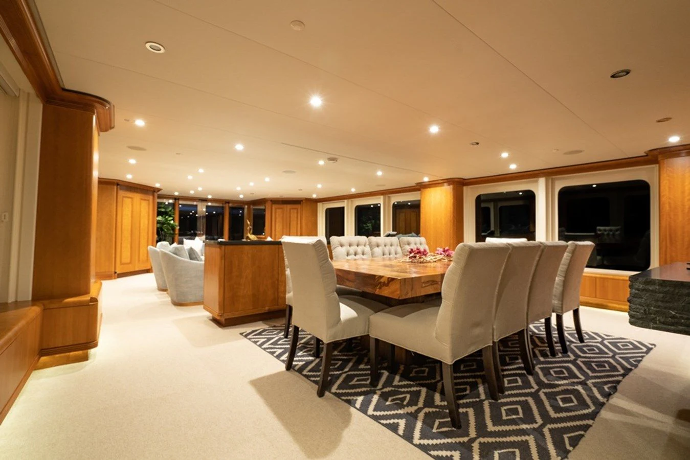 a room with chairs and a table aboard SEA CLASS Yacht for Sale