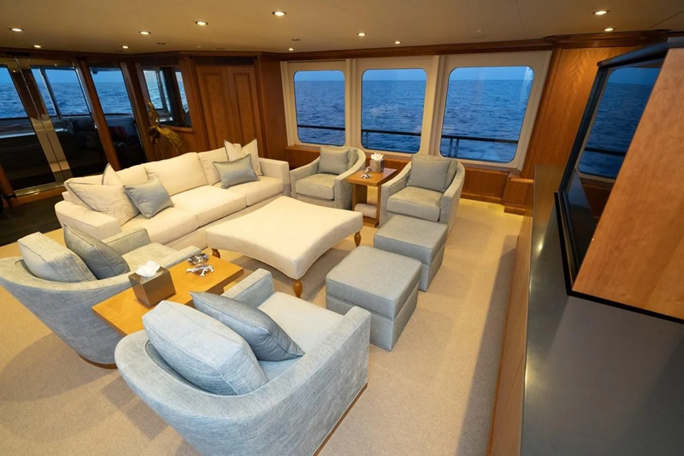 a room with a couch and a table aboard SEA CLASS Yacht for Sale