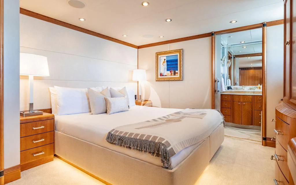 a large bedroom with a bed aboard SEA CLASS Yacht for Sale