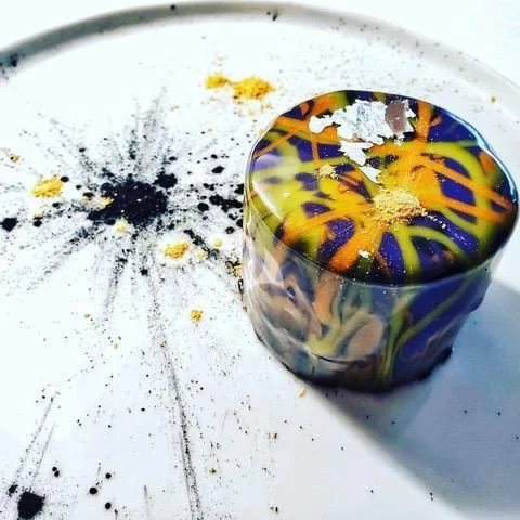 a colorful globe on a white surface aboard SEA CLASS Yacht for Sale