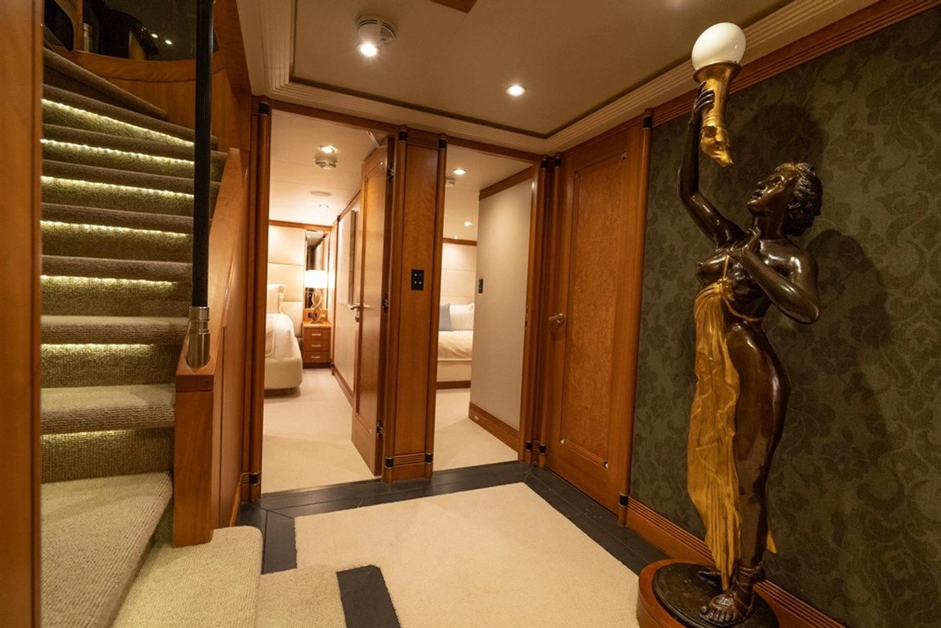 a room with a statue aboard SEA CLASS Yacht for Sale