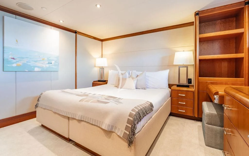 a bedroom with a large bed aboard SEA CLASS Yacht for Sale