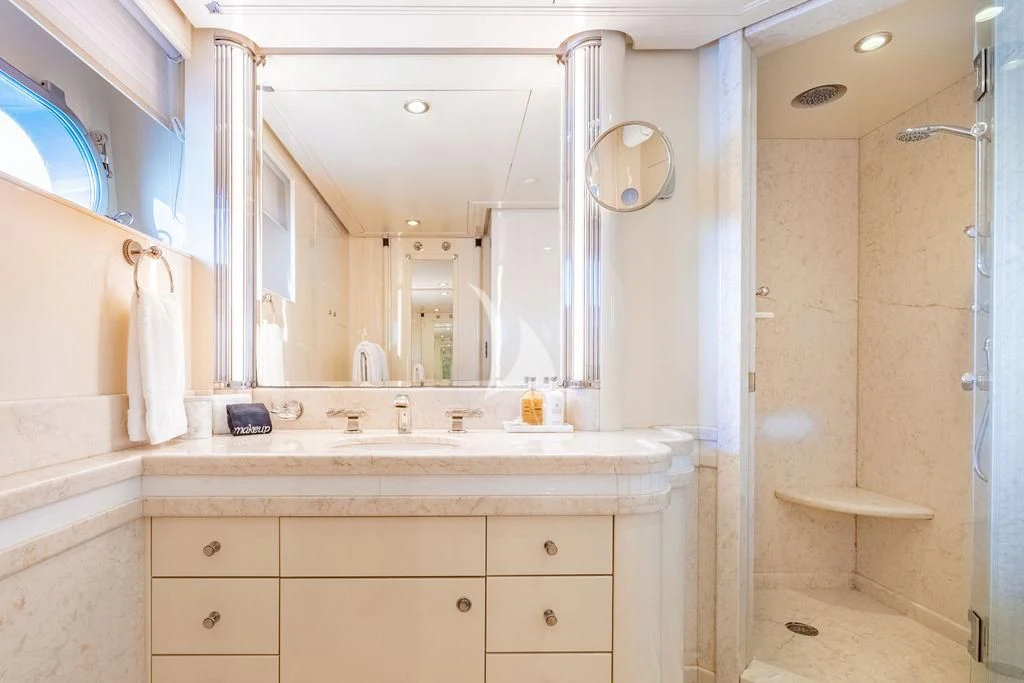 a bathroom with a large mirror aboard SEA CLASS Yacht for Sale