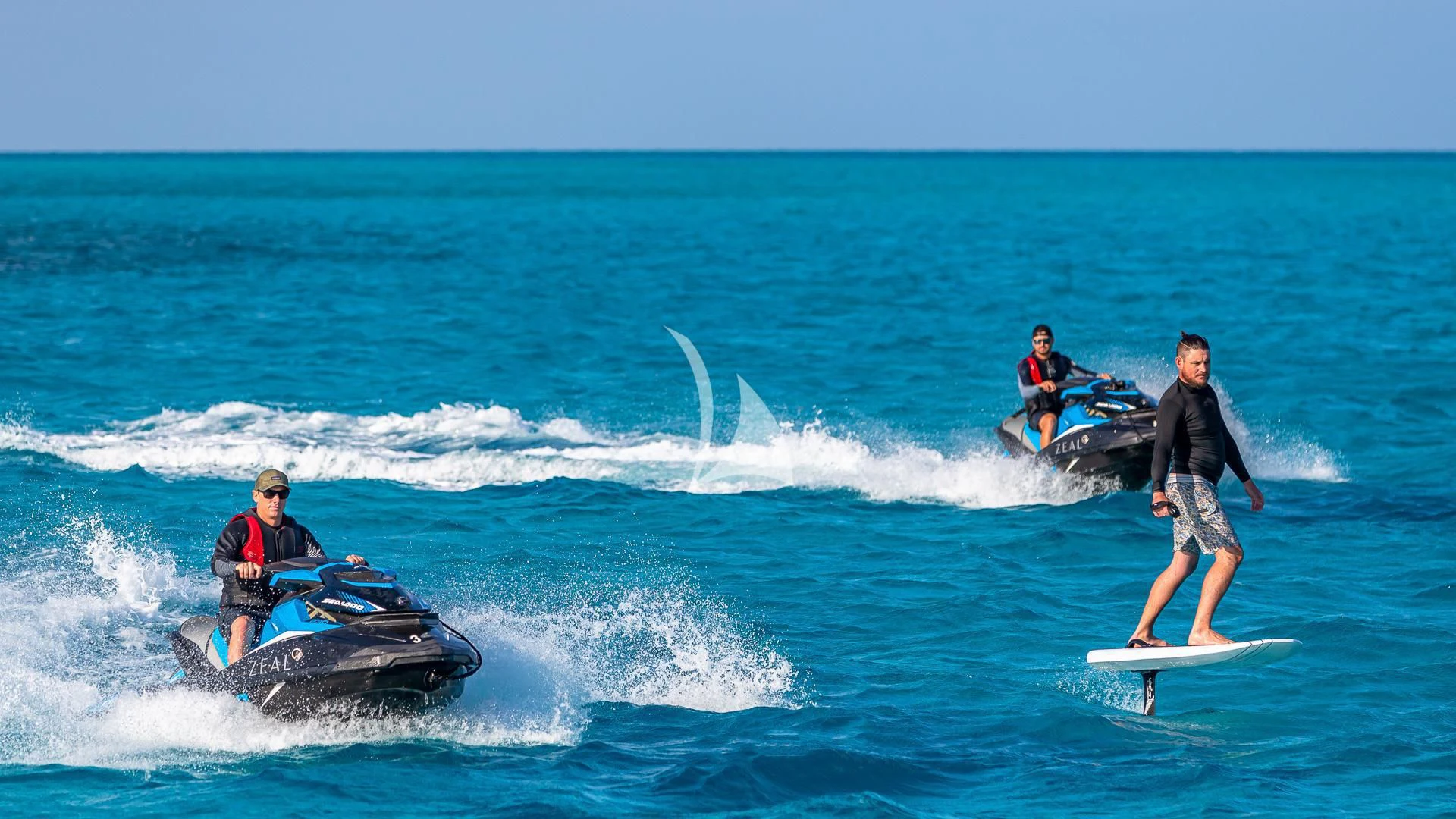 a group of people riding surfboards aboard SEA CLASS Yacht for Sale
