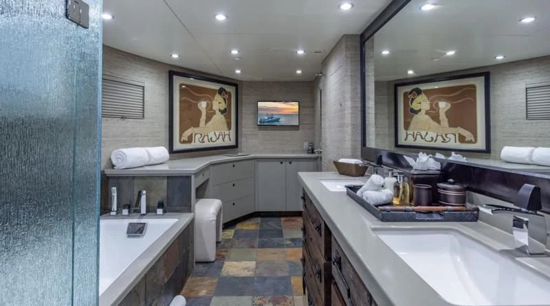 a bathroom with a large mirror aboard SEA CLASS Yacht for Sale