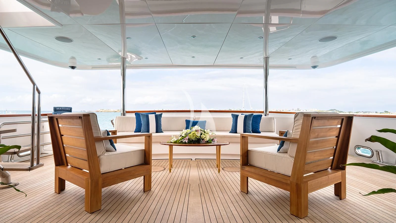 a room with chairs and tables aboard SEA CLASS Yacht for Sale